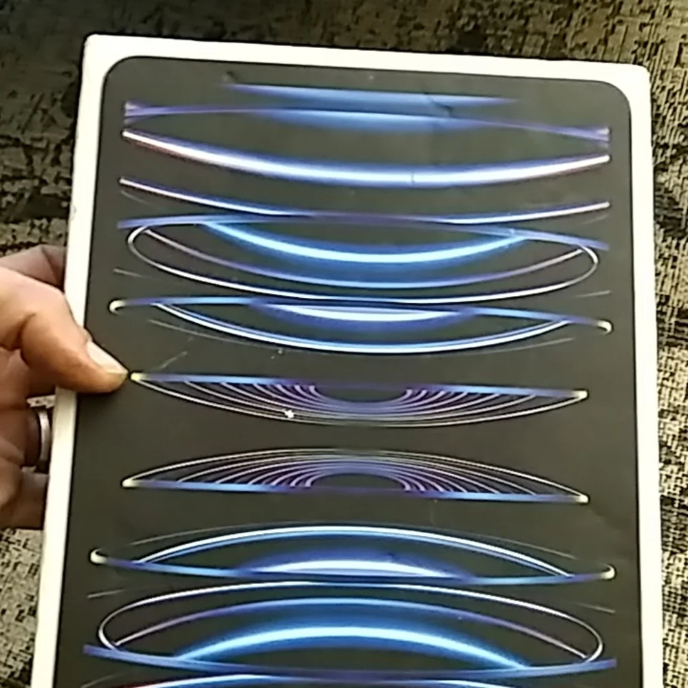 Apple iPad Box with Dynamic Blue and Purple Graphics
